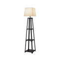 Tapered black shelf floor lamp with beige square fabric shade and two open empty shelves on white background