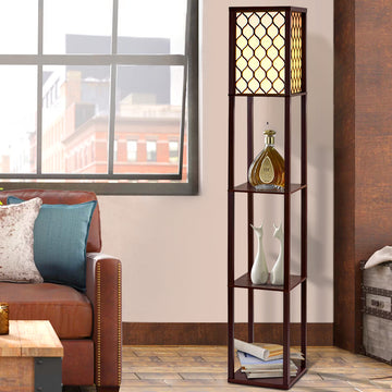 Brown lattice shelf floor lamp in living room with leather sofa, three shelves holding decorative bottle and white vases