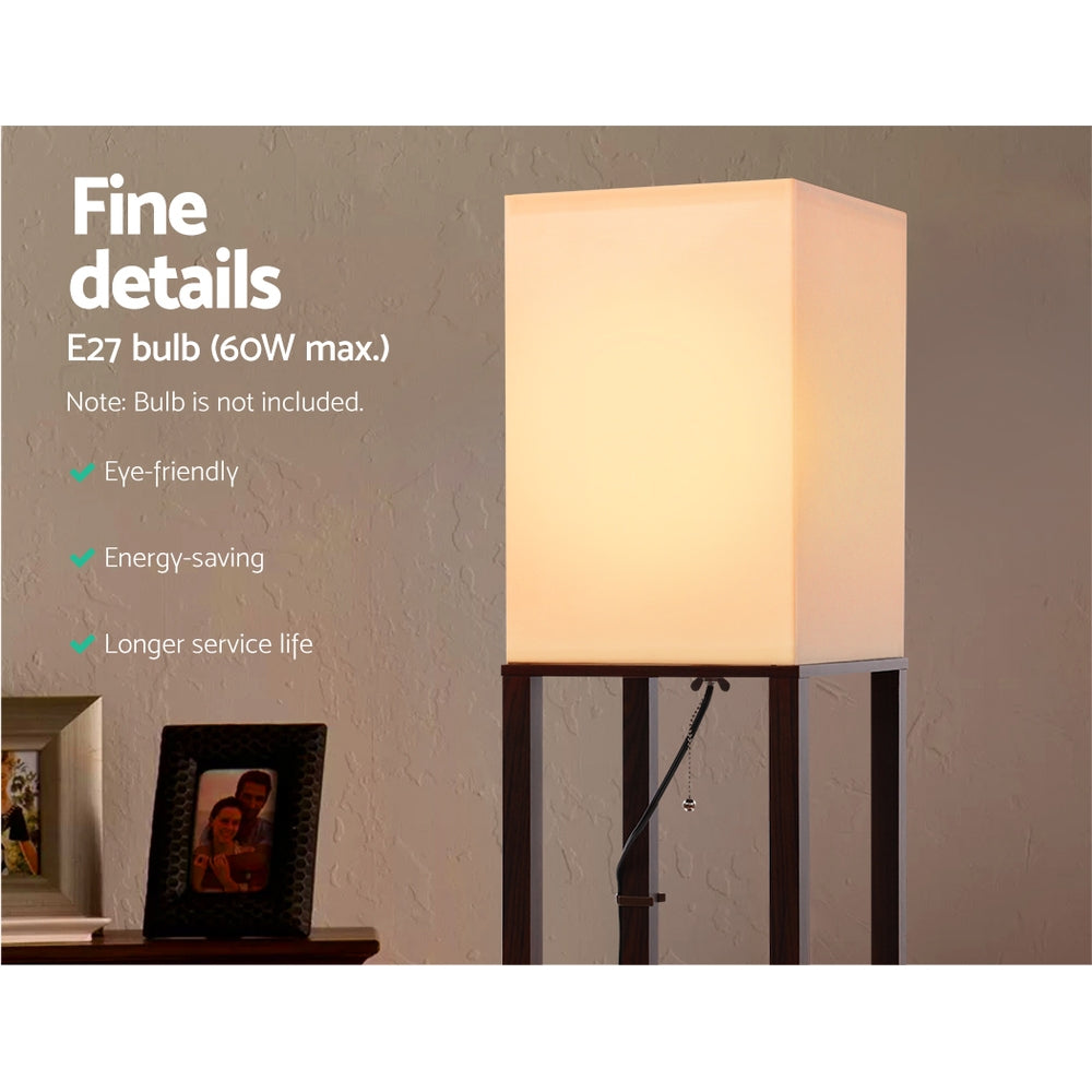 Close-up of lit white square shade of shelf floor lamp with text: E27 bulb 60W max, eye-friendly, energy-saving