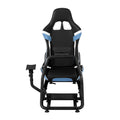 Sim racing cockpit front view on white showing blue white black bucket seat and left-side steering wheel arm mount