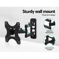 Small full-motion TV bracket three-arm design on concrete wall showing smooth movement and heavy-duty fixings callout circles