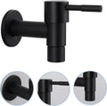 Close-up of black faucet outlet and aerator screen with stainless construction
