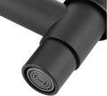 Installed black stainless steel cold water faucet showing lever and spout assembly