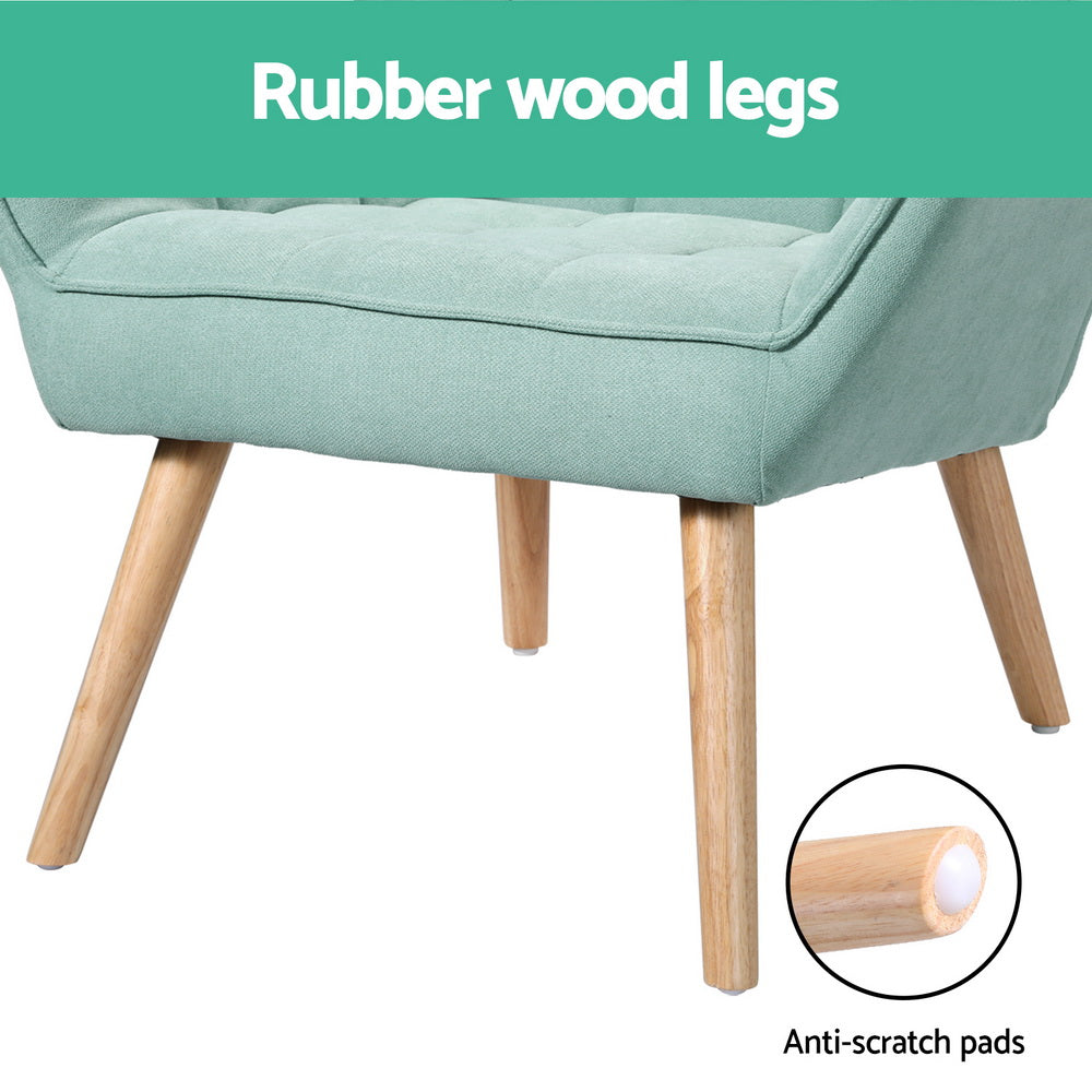 Close-up of teal tufted armchair rubberwood legs with "Rubber wood legs" banner and "Anti-scratch pads" callout