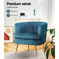 Teal velvet tub armchair in lifestyle lounge setting showing Premium velvet Breathable and Soft touch feature badges