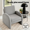 Grey boucle arch-panel armchair in room with callouts: 
