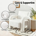 White boucle armchair with callouts: 