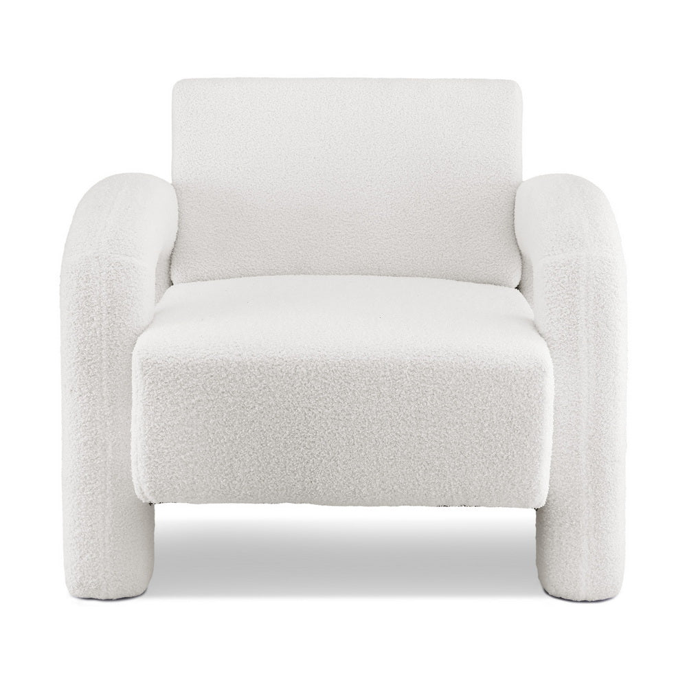 White teddy fabric armchair with arched arms and cylindrical legs, front view on white background