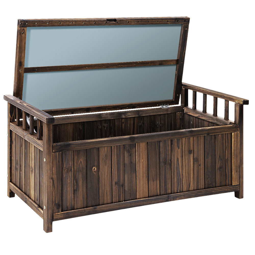 Dark finish timber storage bench with lid fully open, blue-grey padded interior lining visible, white background