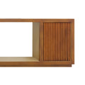 Close-up of Toby TV console right side showing open central bay and cylindrical reeded cabinet door on plinth base