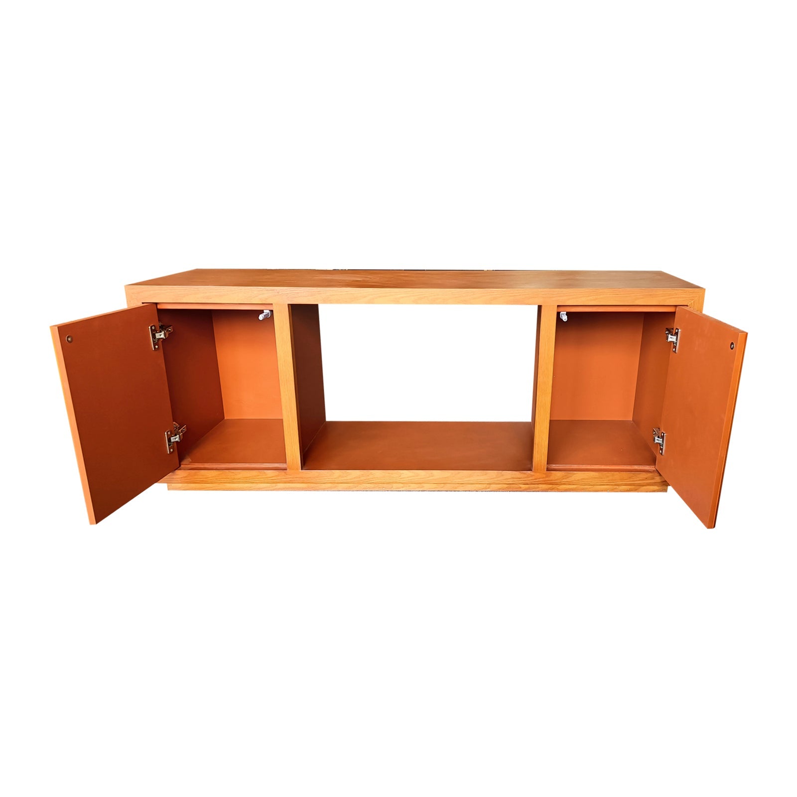 Walnut TV console front view with both cabinet doors open showing orange interior compartments and central open bay