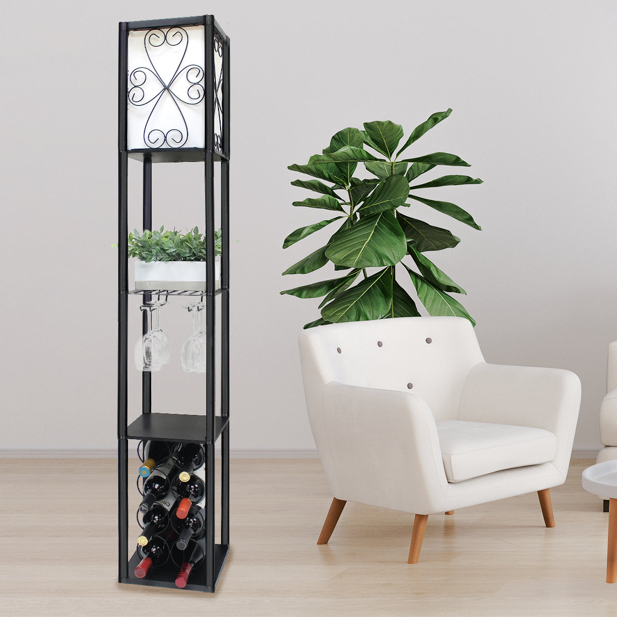 Black tower floor lamp lit in living room, shelves styled with potted plant, hanging wine glasses and wine bottles