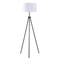 Tripod floor lamp with white cylindrical drum shade and three splayed black metal legs on white background