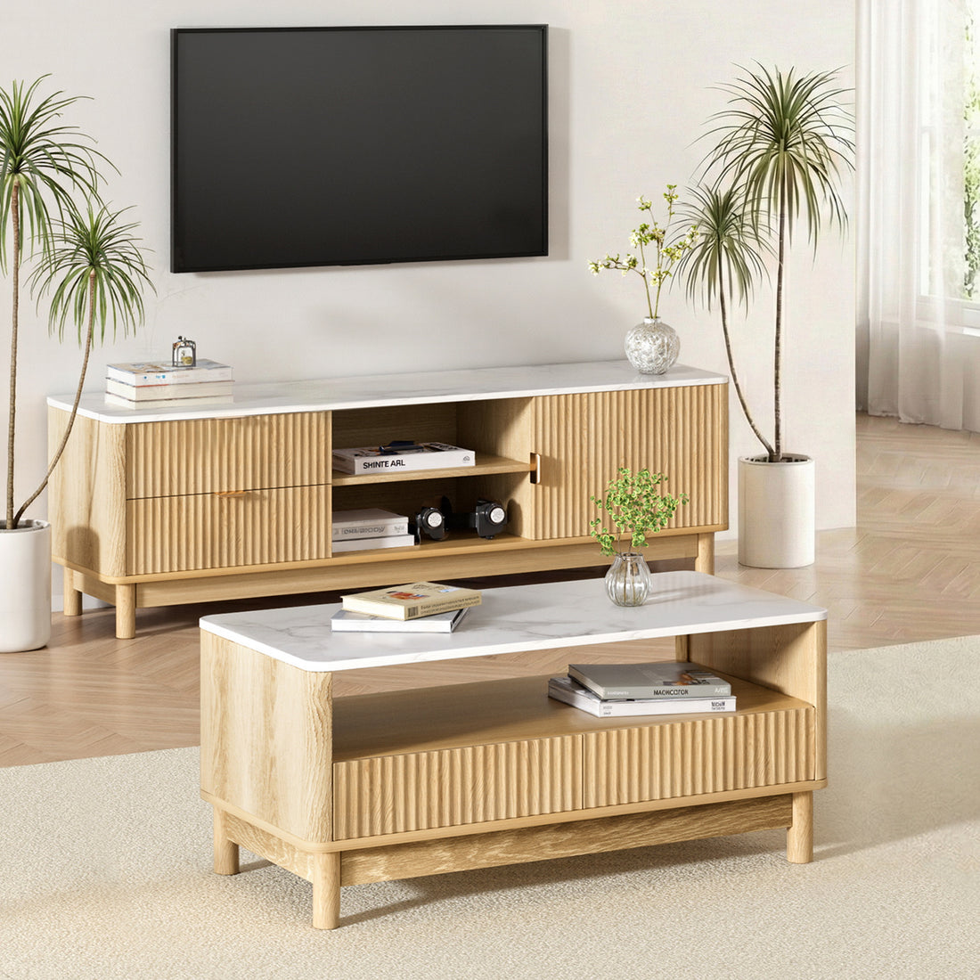 TV unit and coffee table set with white marble tops, natural wood ribbed panels and round legs, styled in bright living room
