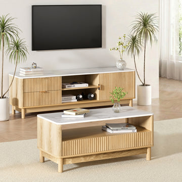 TV unit and coffee table set with white marble tops, natural wood ribbed panels and round legs, styled in bright living room