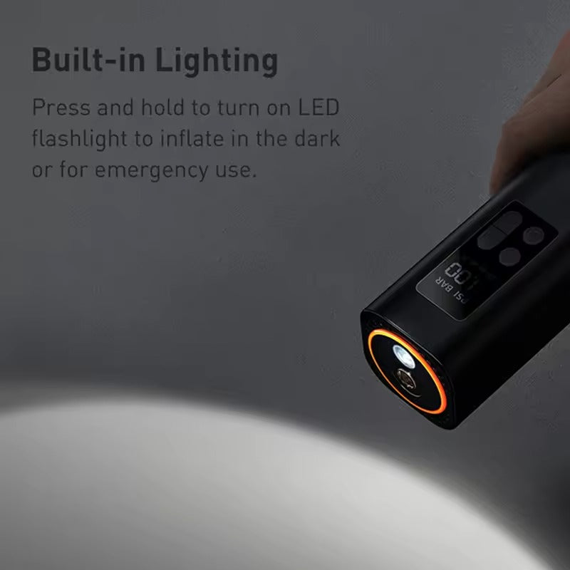 Built-in Lighting: hand holding tyre inflator in dark, LED flashlight on at tip; text: Press and hold to inflate in the dark