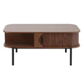 Walnut coffee table front view on white background, sliding slatted door open revealing storage, black metal legs