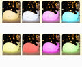 Whale silicone LED lamp shown in 8 colour modes: warm white, white, pink, teal, amber, red, purple and yellow