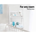 White ladder shelf in nursery with bunny toy, baby bottles and folded clothing; text reads For any room, matching always