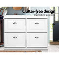 White wide four-door shoe cabinet all doors closed in hallway lifestyle clutter-free design organised and space saving text