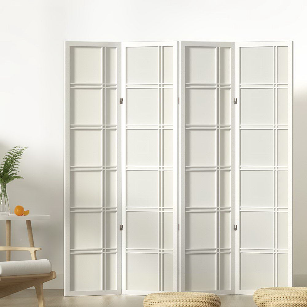 White 4-panel double crosshatch grid shoji room divider in lifestyle room with fern plant orange and floor cushion