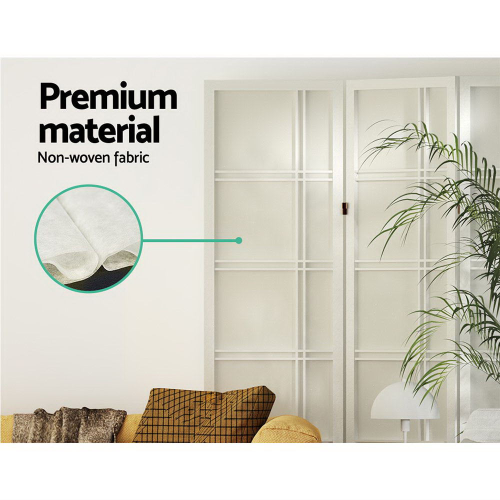 White 4-panel crosshatch shoji divider non-woven fabric close-up in lifestyle room with yellow sofa and palm plant