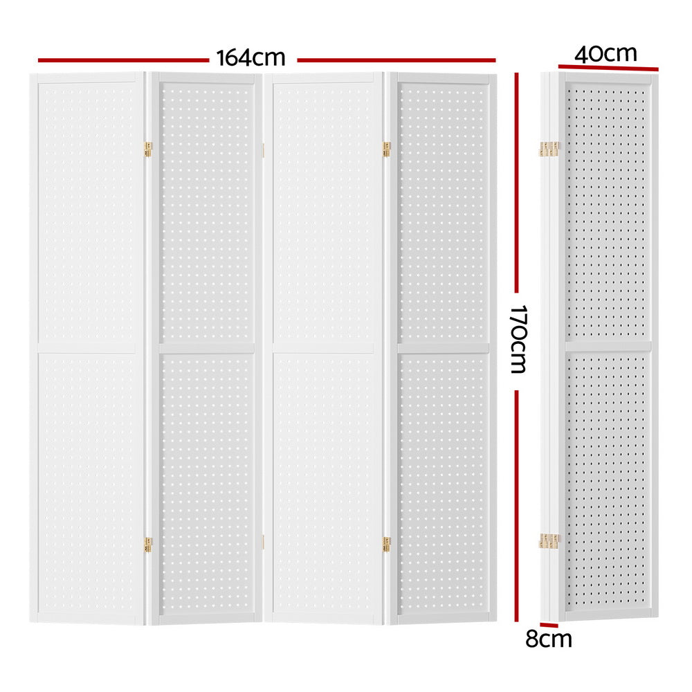 White 4-panel pegboard room divider in lifestyle room with photos on wire grid tote bag scarf and hat on hooks