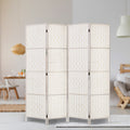 White 4-panel woven paper rope room divider in Scandinavian lifestyle with rattan pendant lamp and dining table