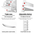 White four-tier shoe cabinet features triple rows adjustable shelves powder-coated handle and smooth open close