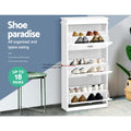White shoe cabinet all three flip-out trays and top open shelf loaded with shoes shoe paradise up to 18 pairs badge visible