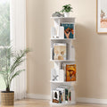5-tier white rotating tower bookshelf with rounded shelves, styled with magazines and books in living room with palm plant