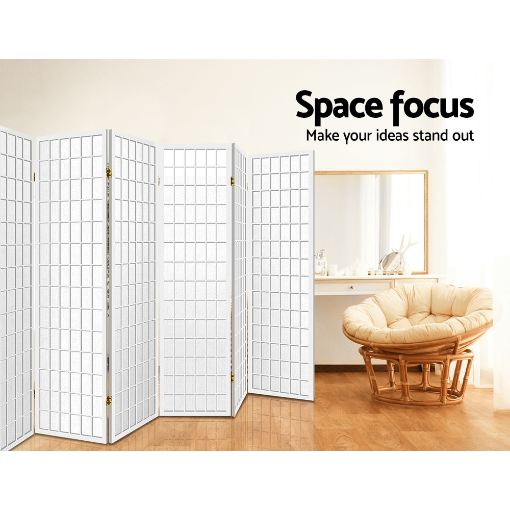 White 6-panel fabric grid room divider in lifestyle room with papasan rattan chair and wood dressing table vanity