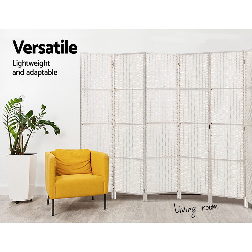 White 6-panel woven paper rope room divider in living room lifestyle with yellow armchair and ZZ plant against white wall
