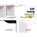 Detail panels of white cube shelf: soft-closing magnetic hinges, air gap handles, and safe rounded edges