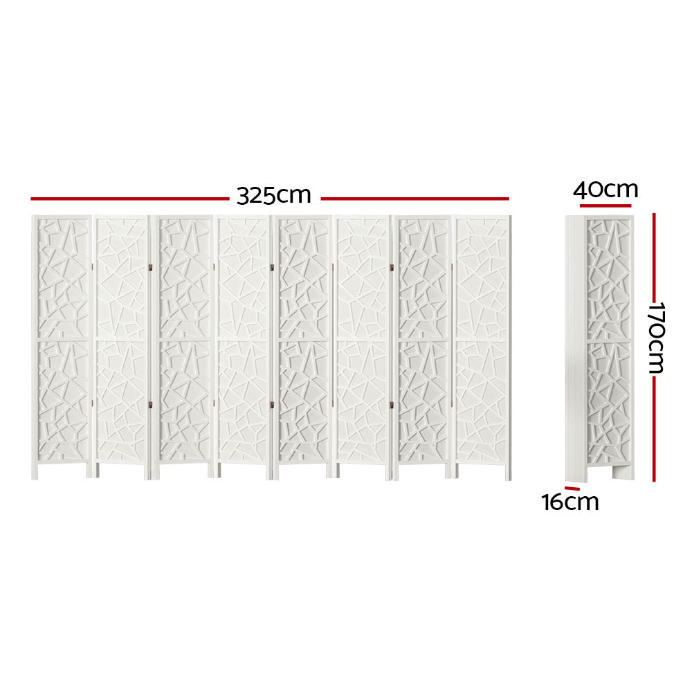 White 8-panel MDF room divider with geometric star pattern cutouts in lifestyle room with chair and ottomans