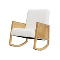White boucle rocking chair with rattan side panels, boucle backrest and seat, natural wood rocking base, white background
