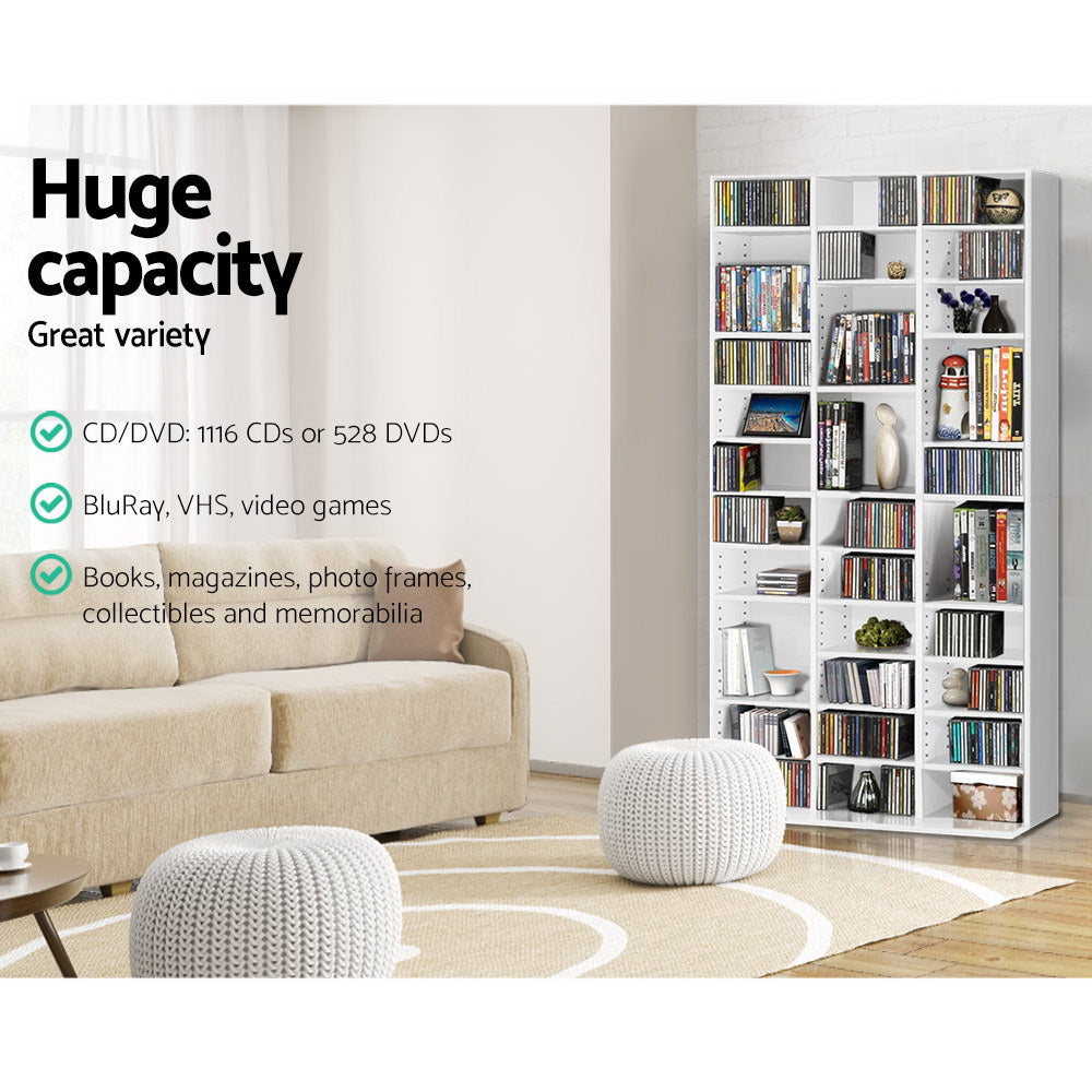 White media storage shelf in living room, text: holds 1116 CDs or 528 DVDs, BluRay, VHS, video games