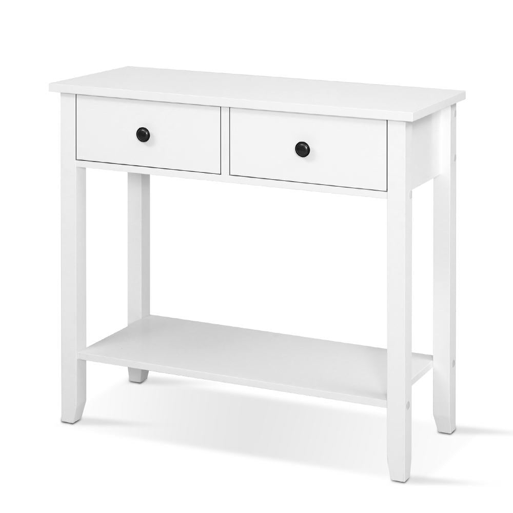 White console table front view: two drawers with black round knobs, lower shelf and tapered legs, white background