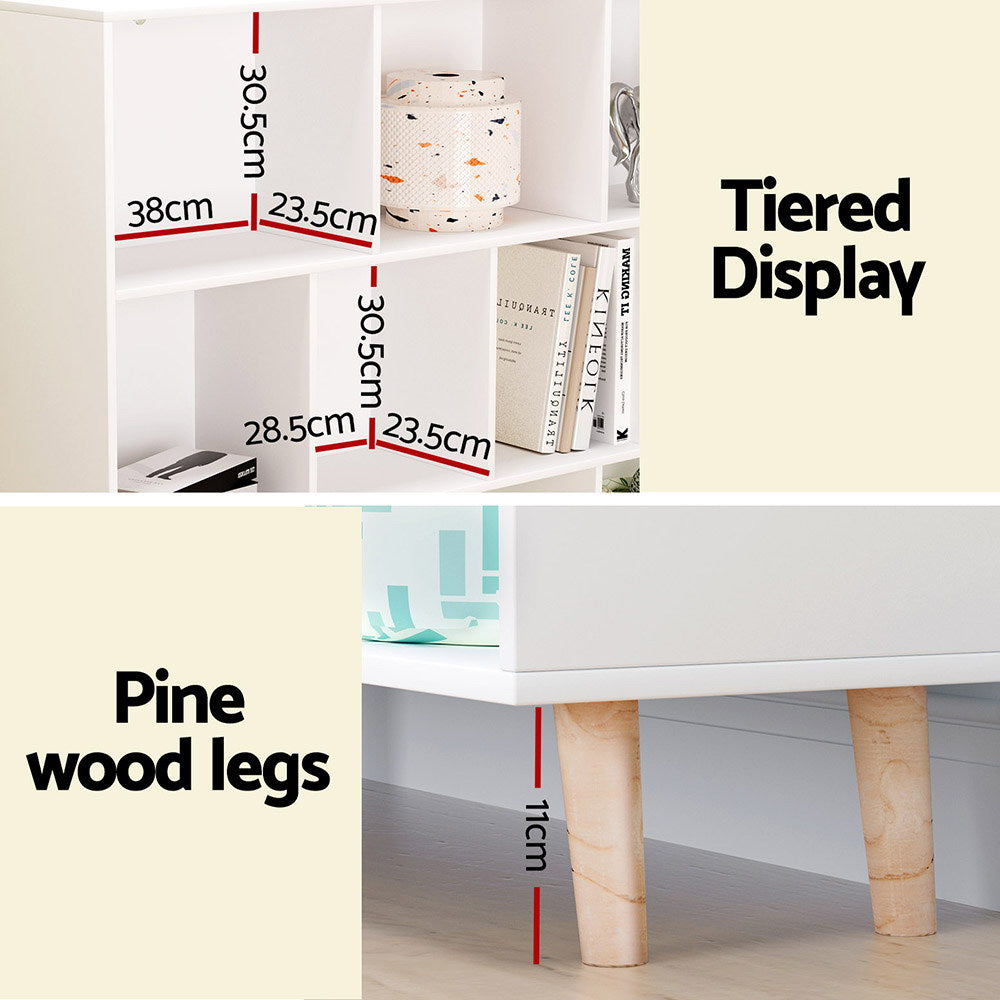 Cube bookshelf detail panel showing compartment sizes 38x23.5x30.5cm, tiered display layout and 11cm pine wood legs