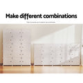 White modular plastic cube shoe rack two configurations tall and wide with make different combinations text on light floor
