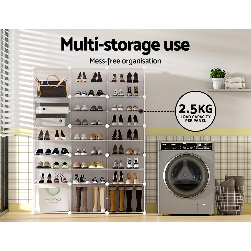 White plastic cube shoe rack loaded with shoes bags and boots next to washing machine 2.5KG load capacity per panel badge