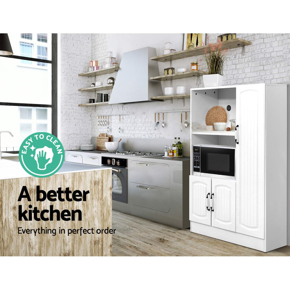 White display cabinet in kitchen with microwave on shelf and rattan items; text: easy to clean, a better kitchen