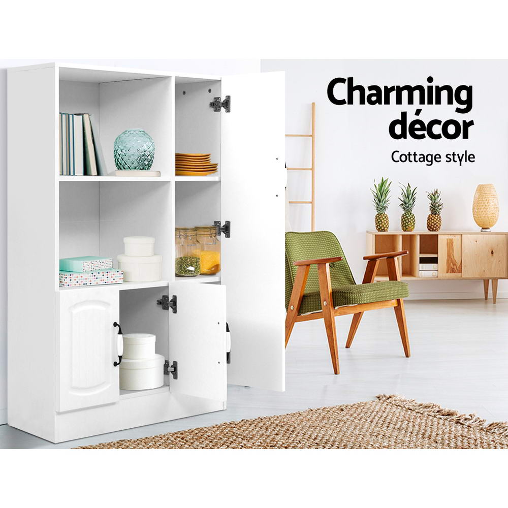 White display cabinet with shelves open in room storing books, vases and jars; text: charming decor, cottage style