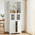 White display hutch cabinet in dining room with lower door ajar showing condiments, snack packets on open shelves