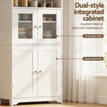 White pantry cabinet close-up with labels 'Frosted glass door' and 'Shaker slatted door', pantry items visible behind glass