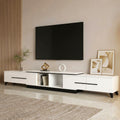 White extendable TV unit in living room with TV above record player radio and books on open shelf in extended position
