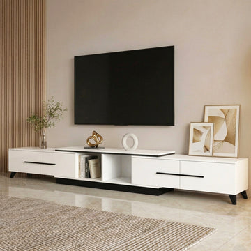 White extendable TV unit in living room with TV above record player radio and books on open shelf in extended position