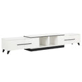 White extendable TV unit extended to 260cm showing 4 drawers and open shelf center on black base on white background