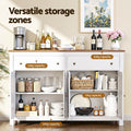 Open white farmhouse sideboard in room with wine bottles and coffee machine on top, capacity labels 10kg, 15kg and 30kg zones