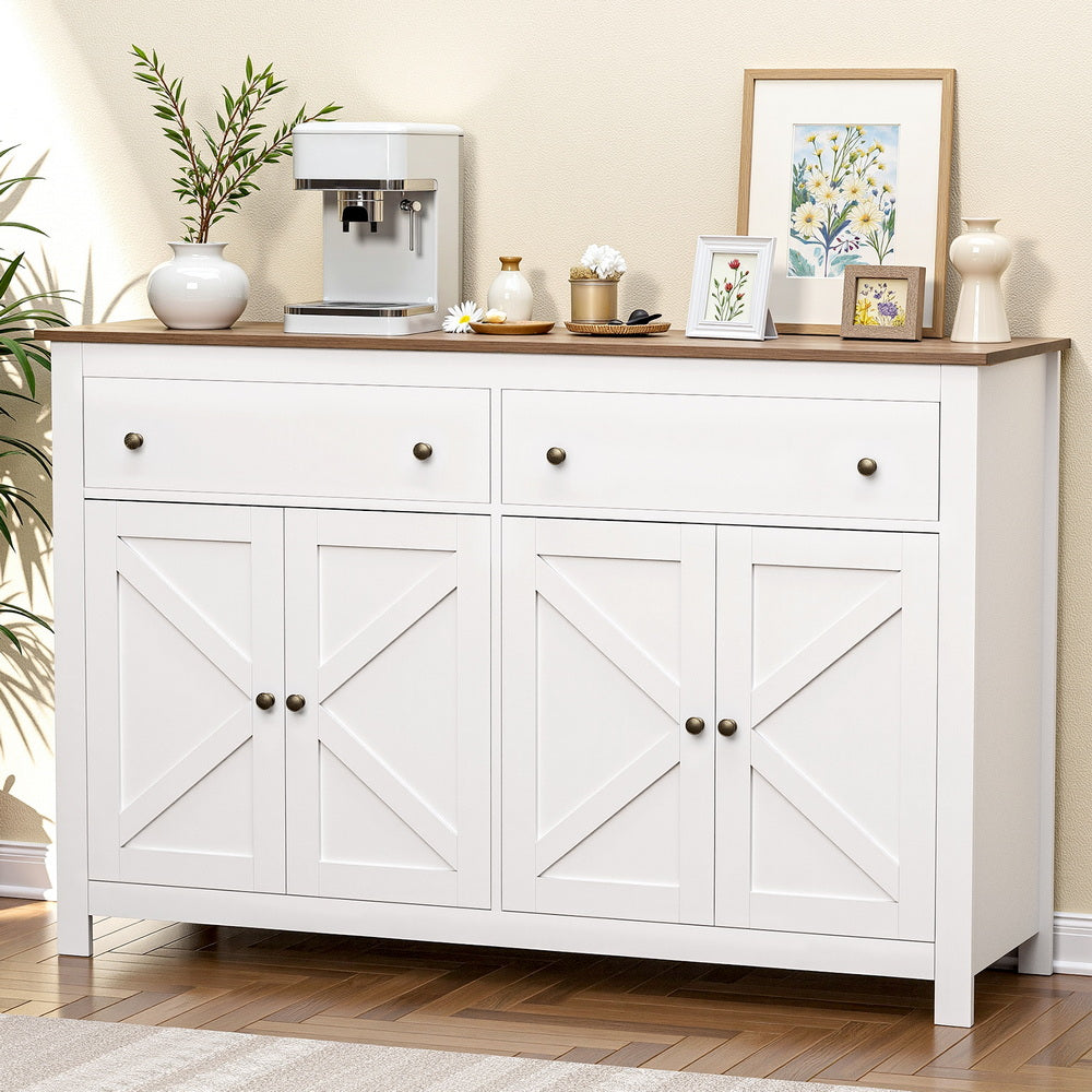 White farmhouse sideboard in room with walnut top, coffee machine, vases and photo frames on top, four X-cross doors below